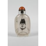 A Chinese reverse decorated glass snuff bottle depicting a Chinese gentleman, with a character