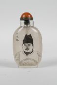 A Chinese reverse decorated glass snuff bottle depicting a Chinese gentleman, with a character