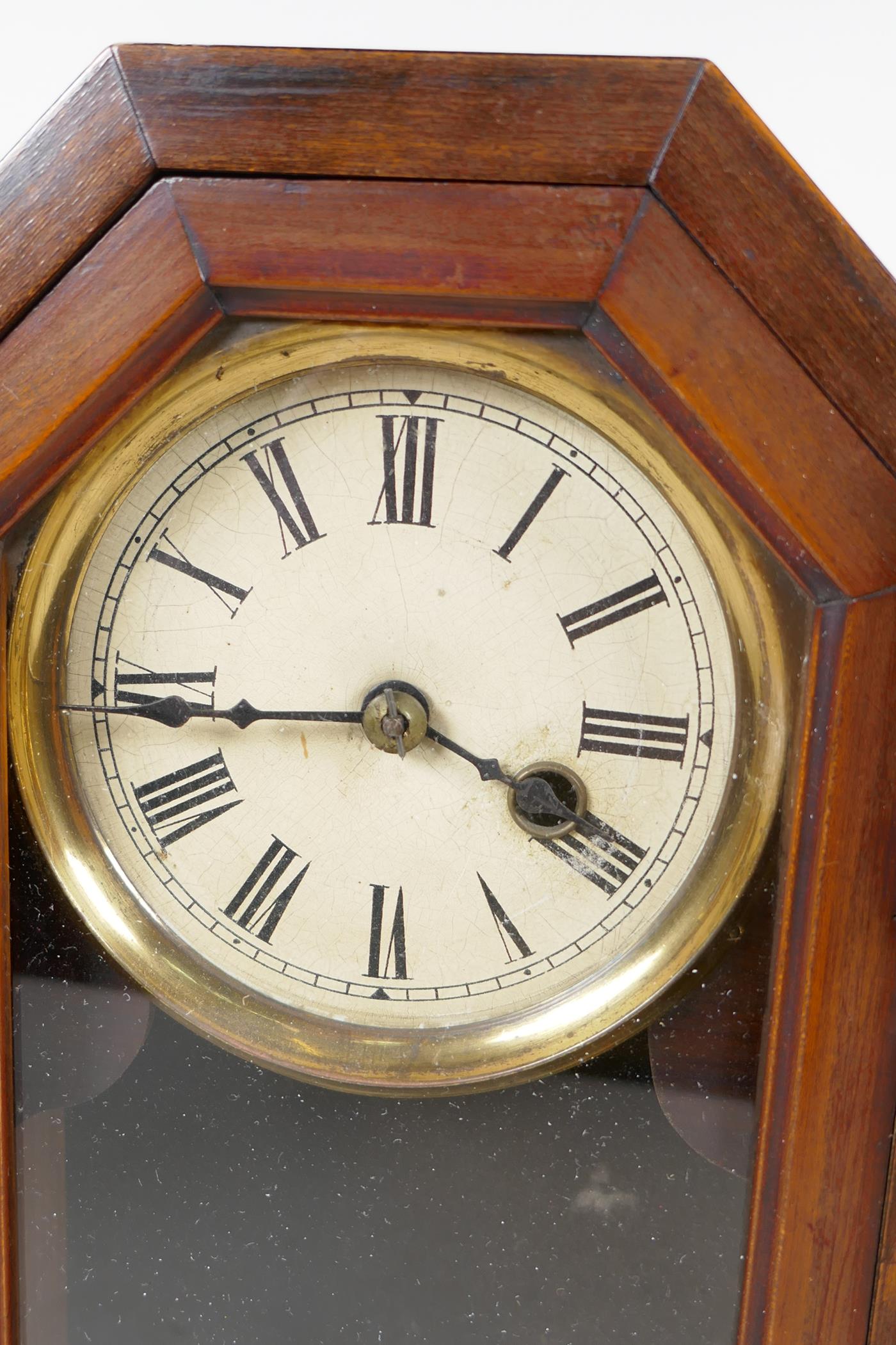 A walnut cased timepiece mantel clock, the case with turned column sides and pierced decoration, - Image 2 of 2