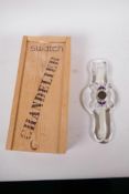 A Swatch Chandelier ladies' wristwatch with glass stand and original box