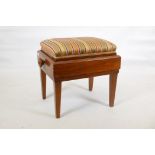 A mahogany piano stool, with wind up scissor action height adjustment, 17" x 22" X 23"