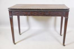 An early C19th Irish mahogany Chippendale style tea table of large proportions, the top with