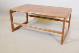 A mid century teak coffee table, 35" x 20" x 16"