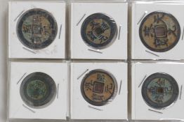 A small album containing 30 replica Chinese coins