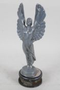 A G. Omerth car bonnet mascot cast as a winged lady standing on a wheel, 6½" high