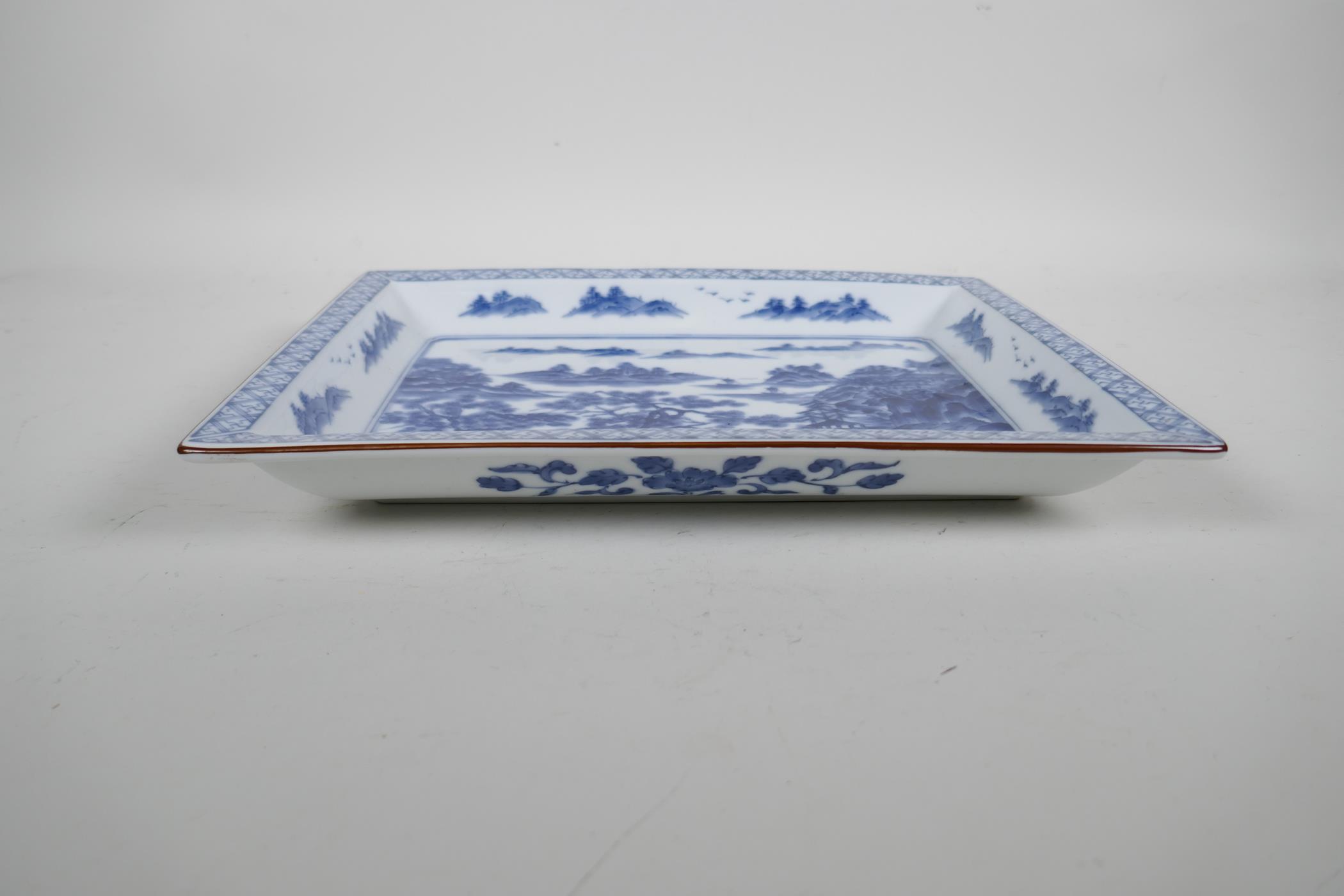 A Chinese blue and white porcelain shallow dish of rectangular form, decorated with a riverside - Image 3 of 5