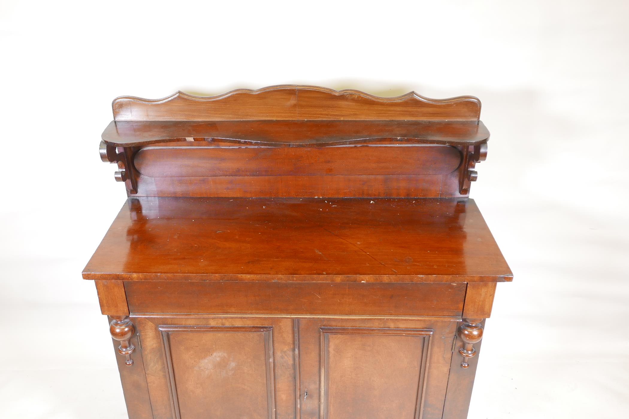 A Victorian mahogany chiffonier, with shaped back and single frieze drawer over two cupboards, - Image 2 of 2