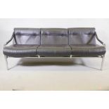 A 1970s Pieff 'Beta' leather and chrome three seat sofa designed by Tim Bates, 68" x 30", 27" high