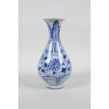 A Chinese blue and white porcelain pear shaped vase with scrolling floral decoration, 7½" high, A/