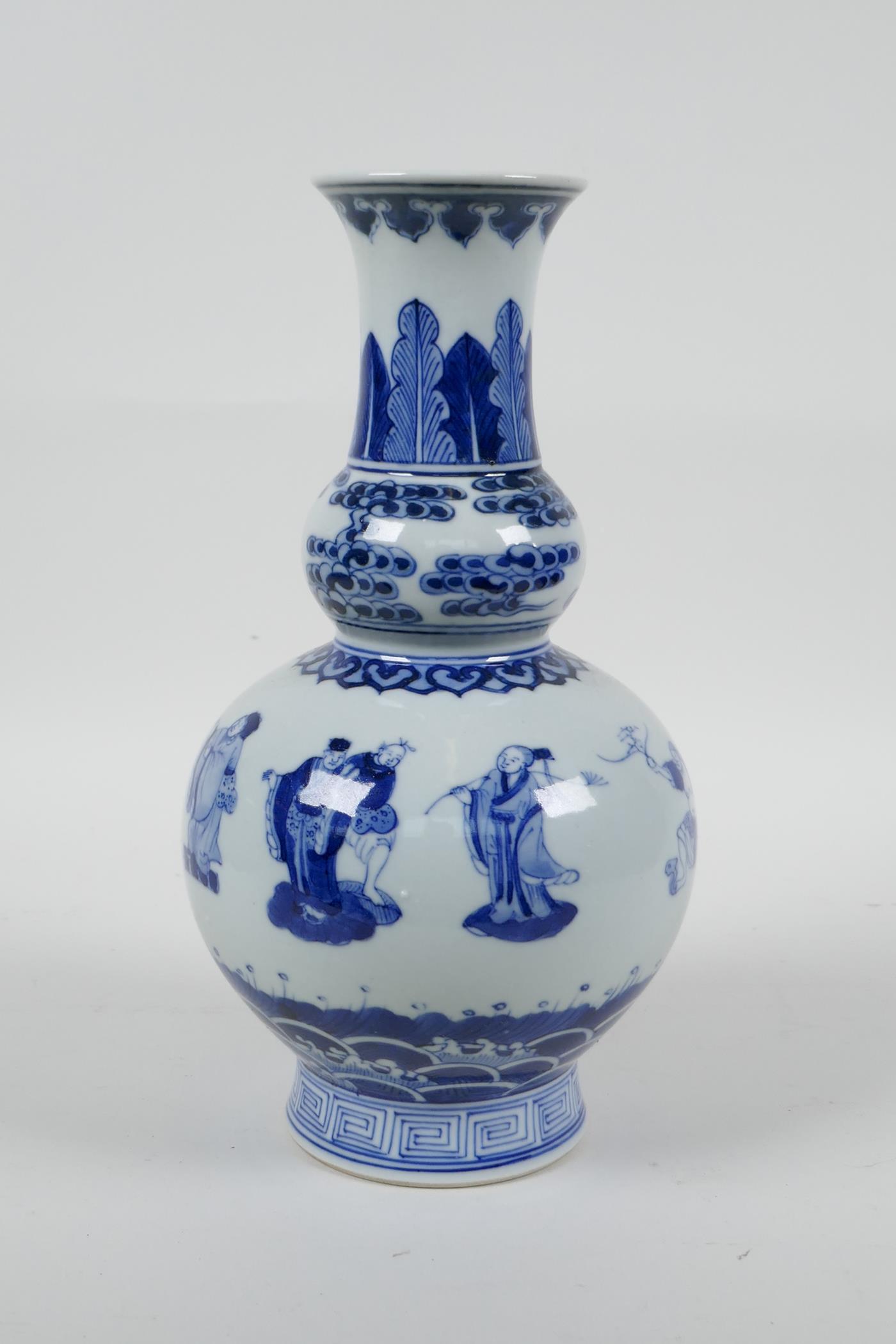 A Chinese blue and white porcelain double gourd vase decorated with the Eight Immortals, 6 character - Image 3 of 6