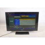 A Panasonic Viera 32" HD TV, model TX-32LZD85, with remote