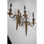 A pair of brass two light wall sconces in the neoclassical style, 13½" high