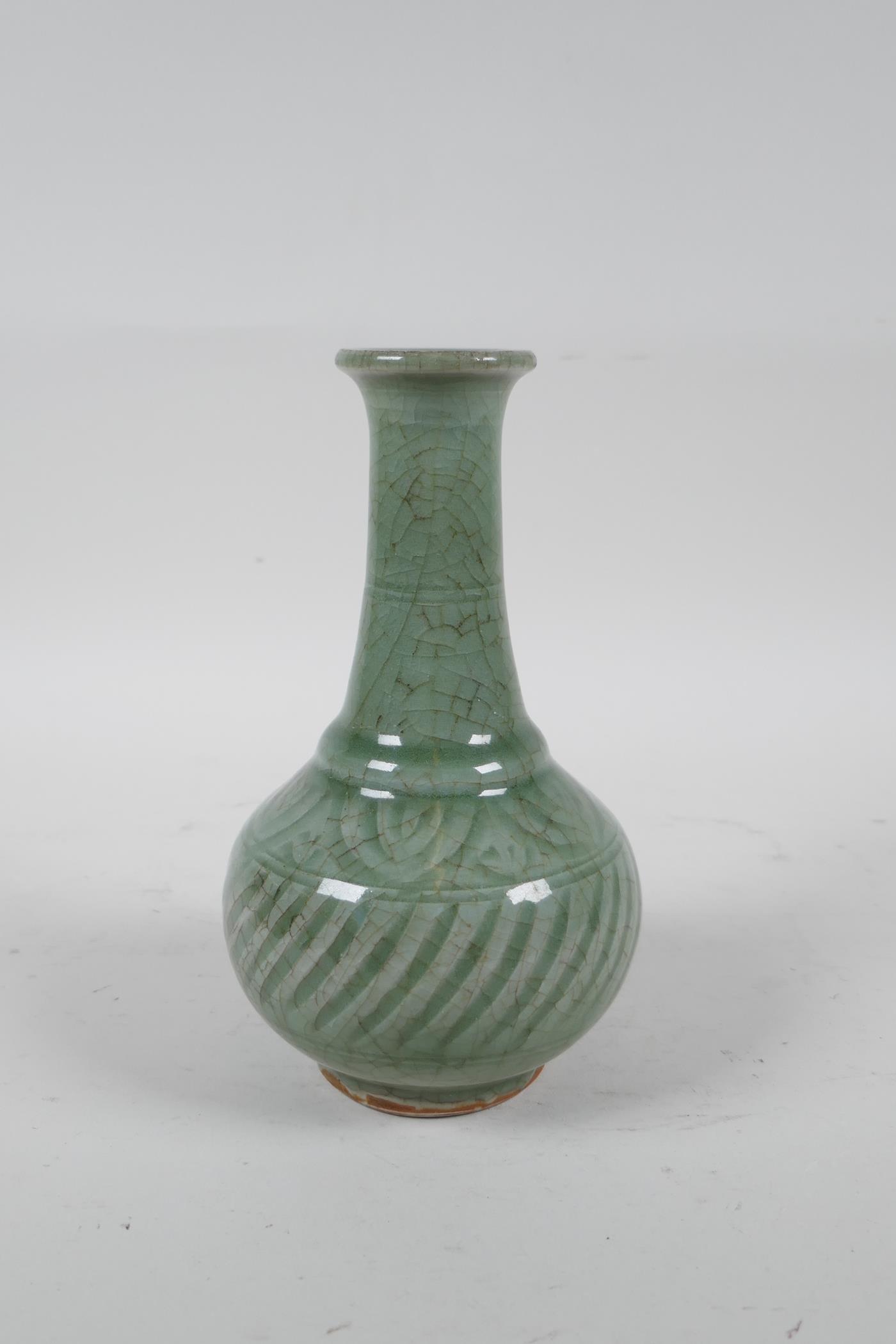 A Chinese celadon glazed porcelain vase with ribbed spiral decoration to the body, 6½" high - Image 2 of 3