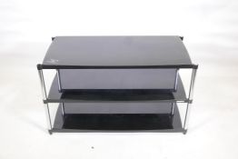 A Soundstyle black metal and chrome, three tier Hi-fi  table with inset black glass tops, 38" x