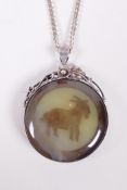 A silver and agate pendant necklace decorated with a goat and Chinese symbols, 2" drop