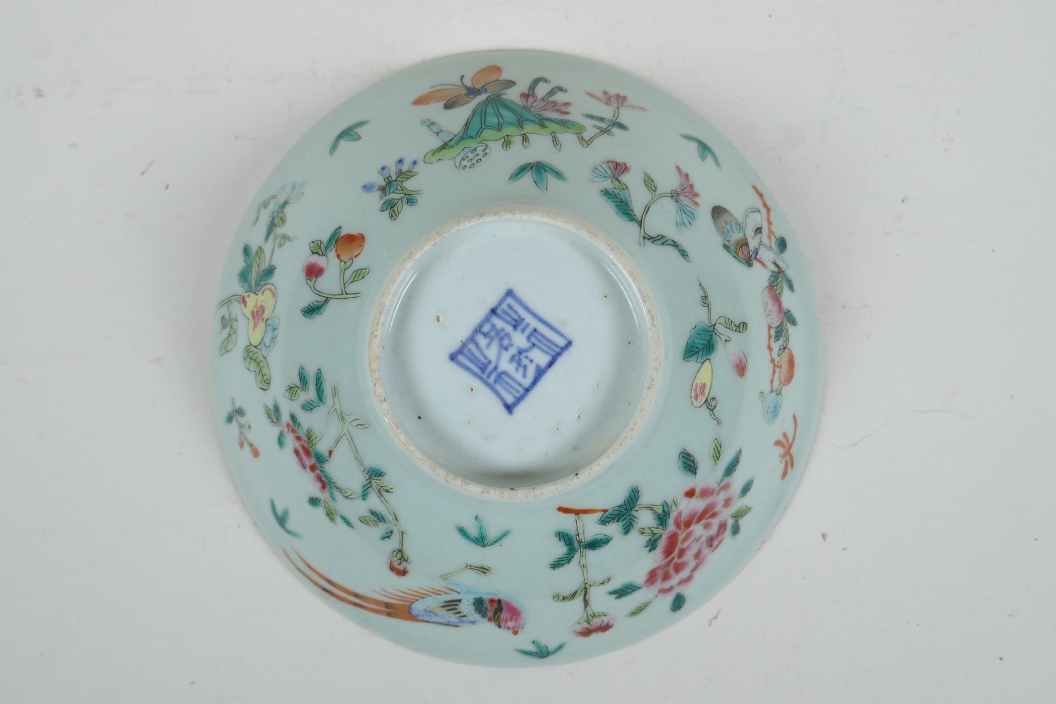 An early C20th Chinese polychrome porcelain dish decorated with Asiatic birds, flowers and - Image 3 of 6