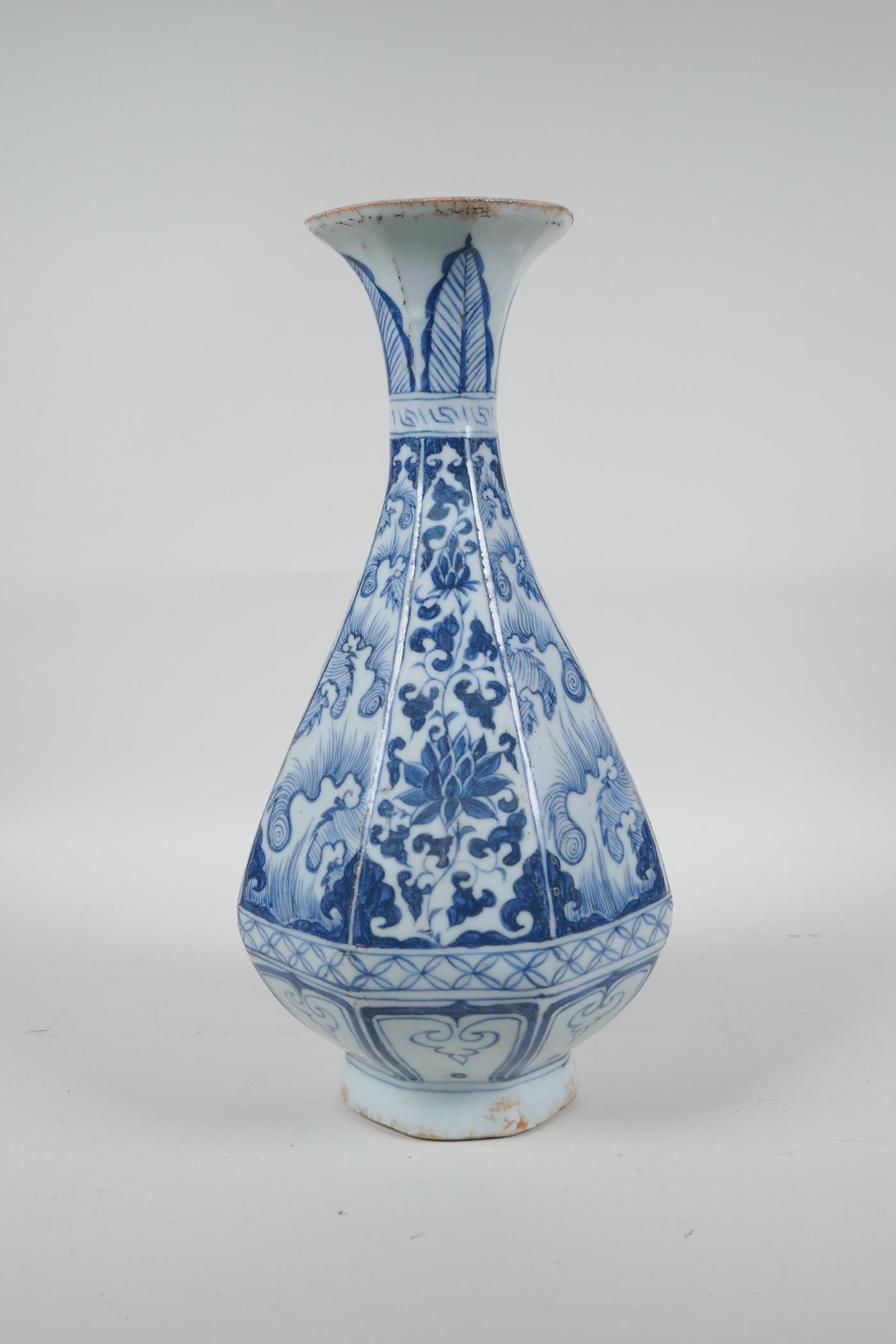 A Chinese Yuan style blue and white pottery pear shaped vase of octagonal form with floral