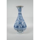 A Chinese Yuan style blue and white pottery pear shaped vase of octagonal form with floral