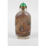 A Chinese reverse decorated glass snuff bottle depicting fishermen, 4" high