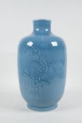 A Chinese blue glazed porcelain vase with underglaze floral decoration, seal mark to base, 11" high