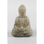 A Chinese mottled hardstone carving of Buddha, 2½" high