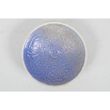 A Chinese Song style blue glazed shallow dish, with lotus flower and carp decoration, 5" diameter