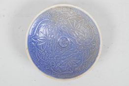 A Chinese Song style blue glazed shallow dish, with lotus flower and carp decoration, 5" diameter