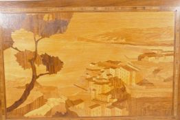 A Sorrento wood panel with inlaid decoration of an Italian cliffside village, 23½" x 16"