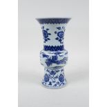 A Chinese blue and white porcelain gu shaped vase decorated with a phoenix and flowers, 6