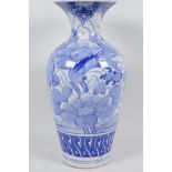 A Chinese blue and white porcelain vase decorated with birds and flowers, 12½" high