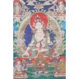 A Sino-Tibetan printed thangka depicting various facets of Buddha, with hand painted embellishments,