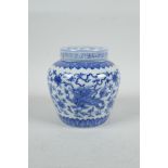 A Chinese blue and white porcelain ginger jar and cover decorated with mythical creatures and