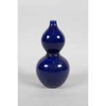 A Chinese powder blue glazed porcelain double gourd stem vase, seal mark to base, 4½" high