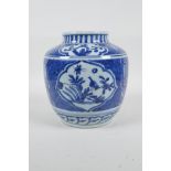A Chinese blue and white porcelain pot, with decorative panels depicting birds and flowers, 6½" high