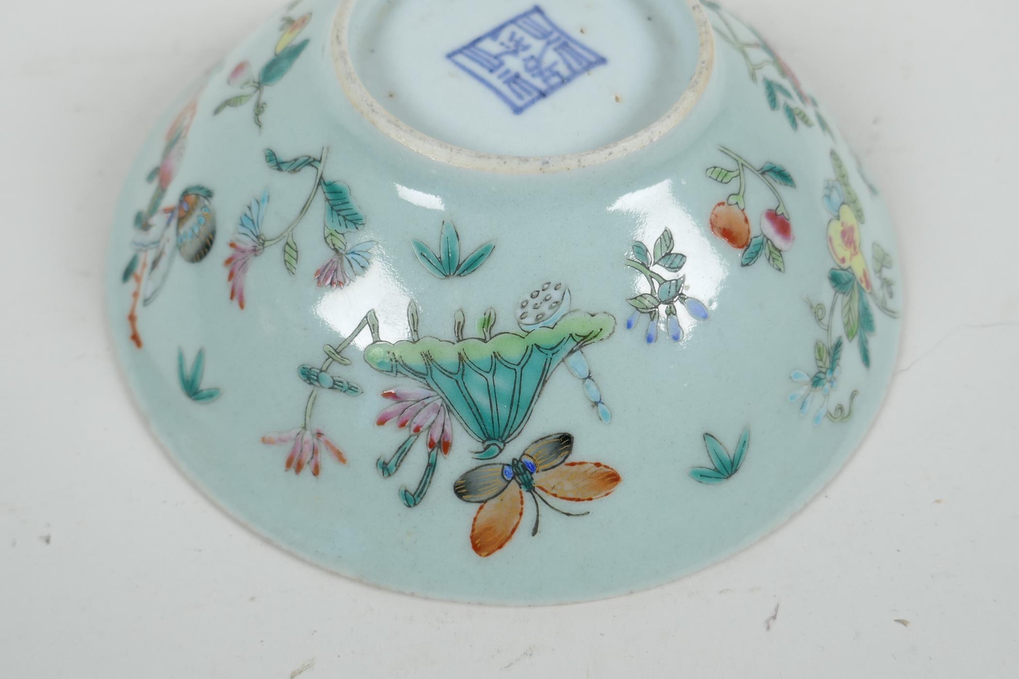 An early C20th Chinese polychrome porcelain dish decorated with Asiatic birds, flowers and - Image 6 of 6