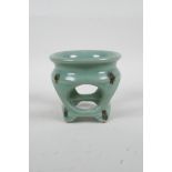 A Chinese green glazed pottery stand, 3½" high