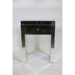 A contemporary mirrored glass single drawer side table, 20" x 13" x 26"