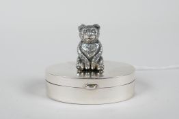 A 925 silver needle box with a teddy bear pincushion mount to the lid, 1½" wide, 1" high