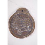 A Chinese bronze pendant decorated with calligraphy and seal mark, the reverse with running