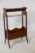 A C19th mahogany book trough with rack and shelf, raised on shaped supports, 22" x 9" x 37"