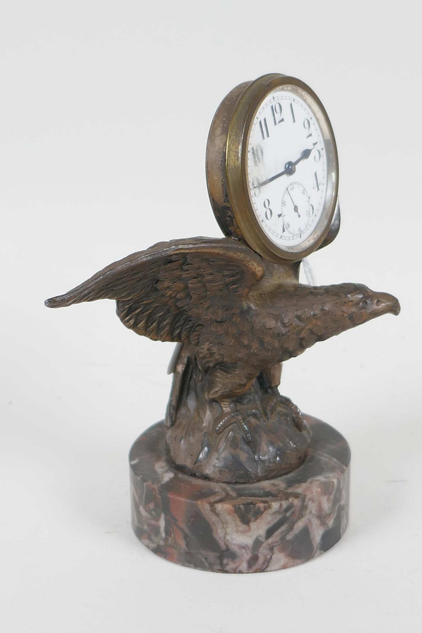 A desk clock cast as an eagle with spread wings, mounted on a marble plinth, 5" high - Image 3 of 4