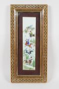 An Indian miniature painting on ivorine depicting polo players, in a micro-mosaic frame, 5½" x