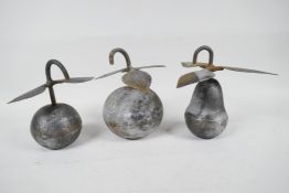 Three Asian metal model fruits, with leaves engraved with figures and flowers, 6" high