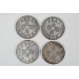 Four Chinese facsimile white metal coins/token, 1½" diameter