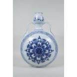 A Chinese Ming style blue and white garlic head shaped flask with two handles and Yin Yang