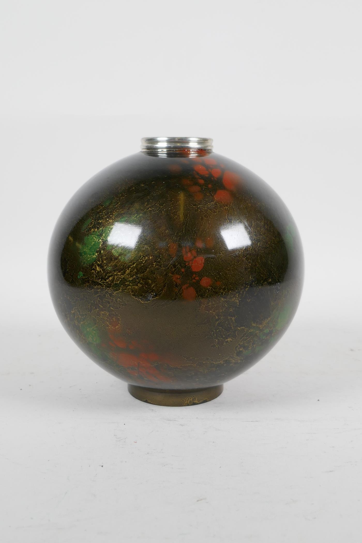 A Japanese enamelled metal globular vase with green and red speckled decoration on a bronze style