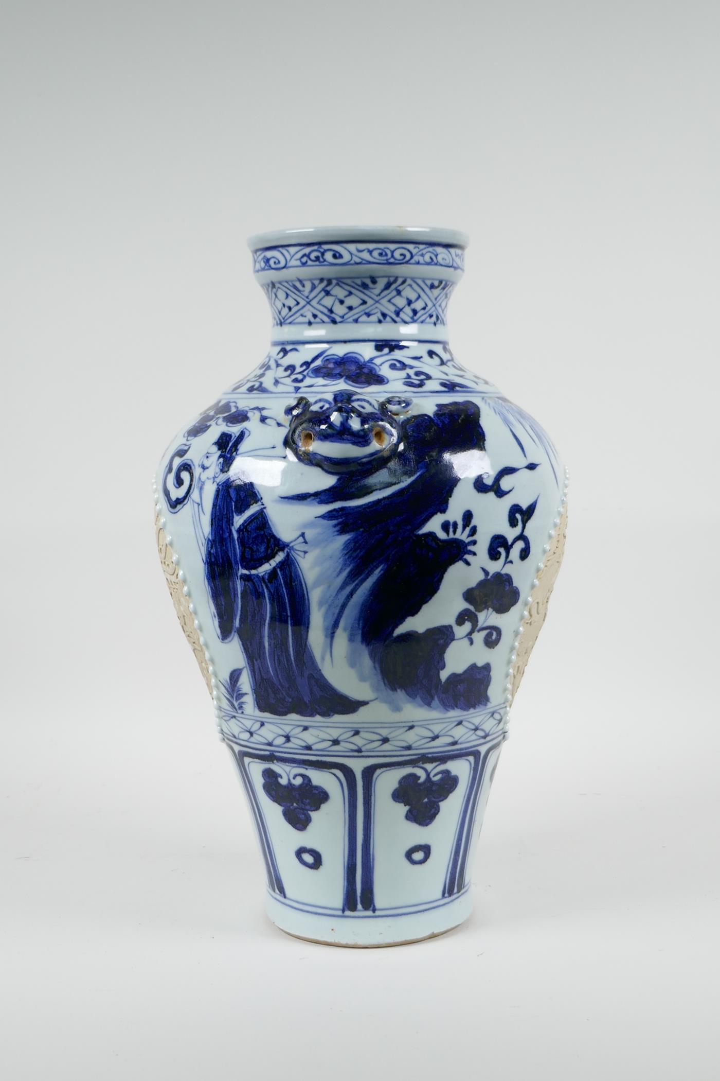 A Chinese blue and white porcelain vase with two lion mask handles, chased decorative panels - Image 3 of 8