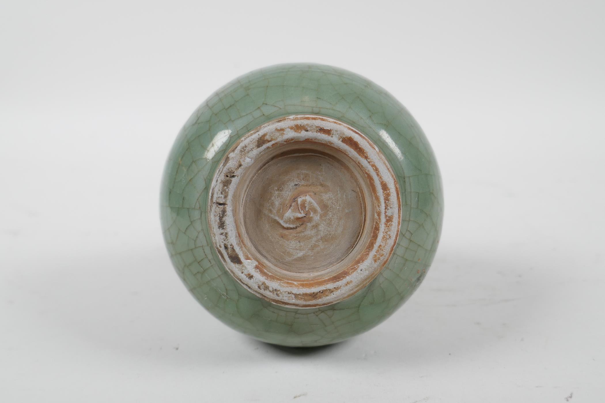 A Chinese celadon glazed porcelain vase with ribbed spiral decoration to the body, 6½" high - Image 3 of 3