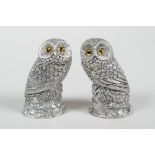 A pair of silver plated owl condiments, 2" high