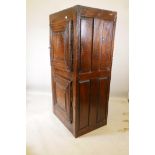 A French oak cupboard with two doors and panelled sides, late C17th/early C18th, 31" x 23" x 66"